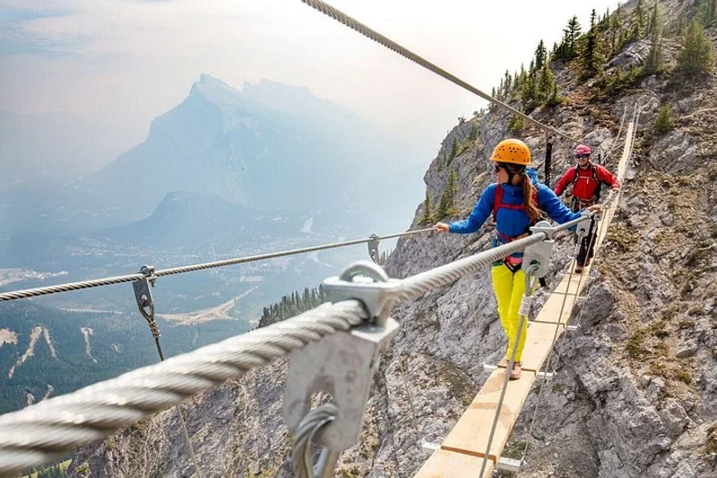 Guided via ferrata climbing above Banff at Mount Norquay